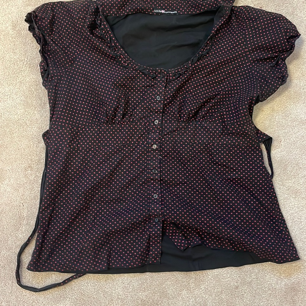 black with red polka dot blouse